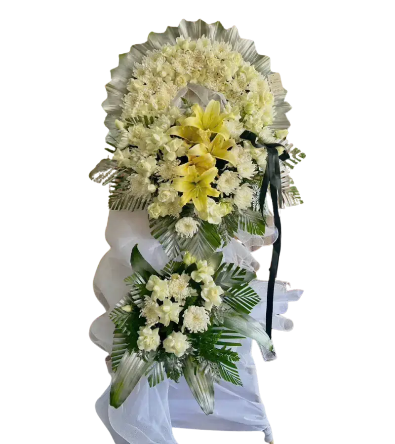 Kệ hoa tang lễ lily vàng cúc trắng nơ đen