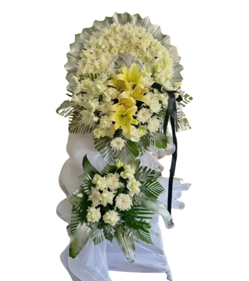 Kệ hoa tang lễ lily vàng cúc trắng nơ đen