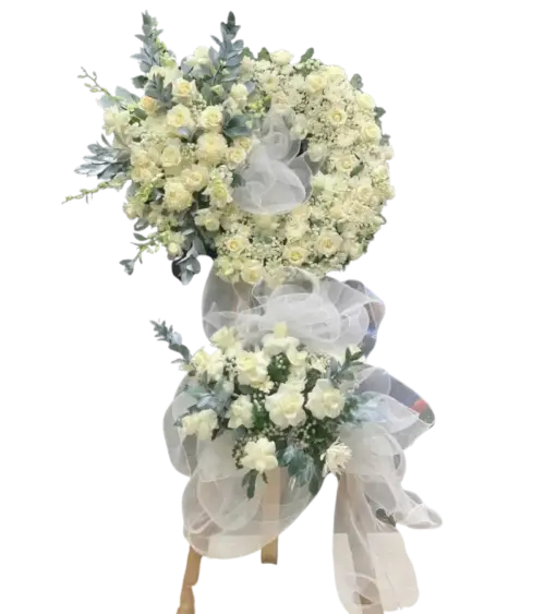 Kệ hoa tang lễ hồng trắng cúc trắng lá bạc nơ lưới trắng