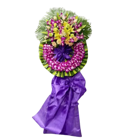 Vòng hoa chia buồn ly vàng cẩm chướng nơ tím